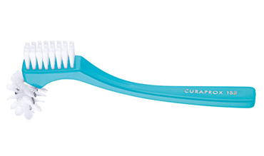 CURAPROX BDC SPAZZOLINO BREVETTATO PER DENTIERE 1 PEZZO COLORE AZZURRO - Farmacia De Pasquale